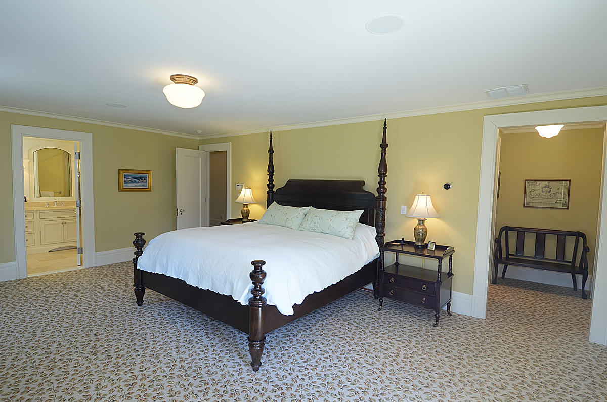 1081 Ponus Ridge Road New Canaan, CT 06840 - Photo 17 of 37 a bedroom with a bed and dresser