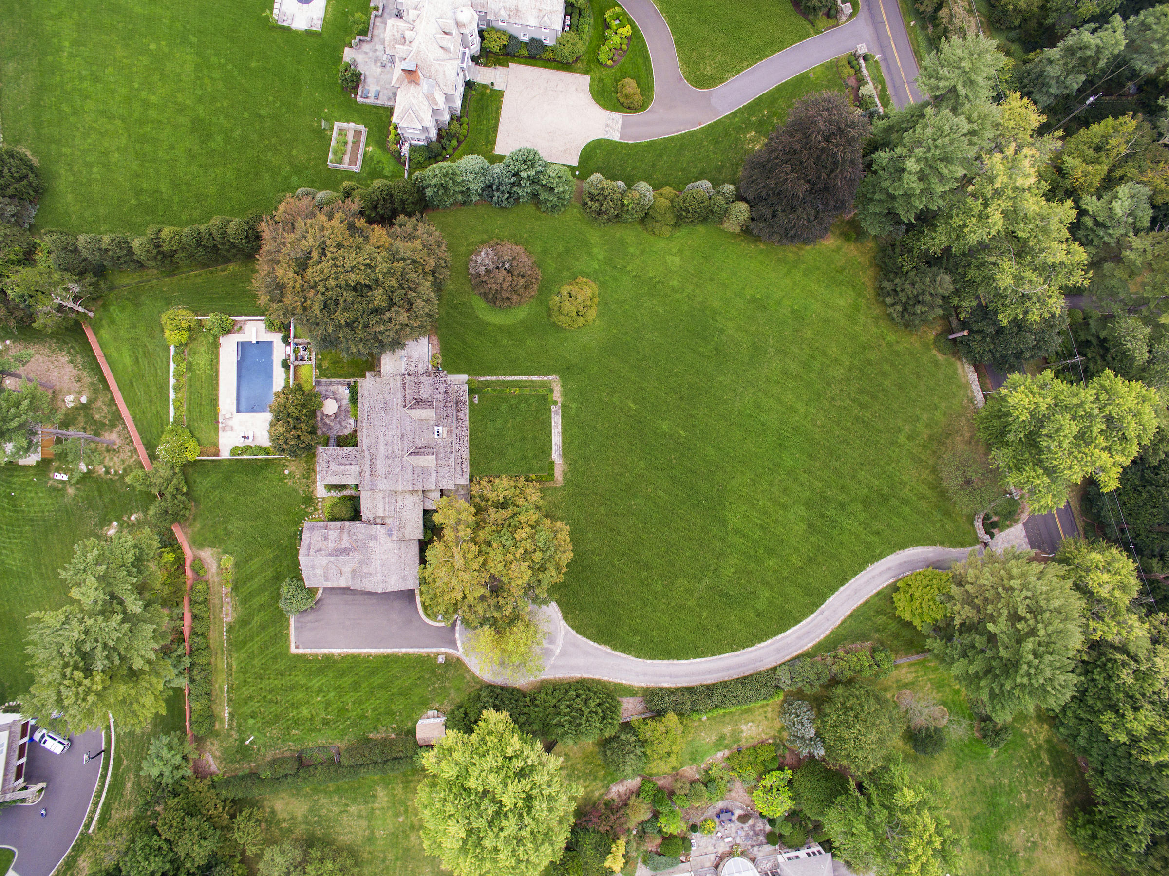 1081 Ponus Ridge Road New Canaan, CT 06840 - Photo 3 of 37 an aerial view of a house