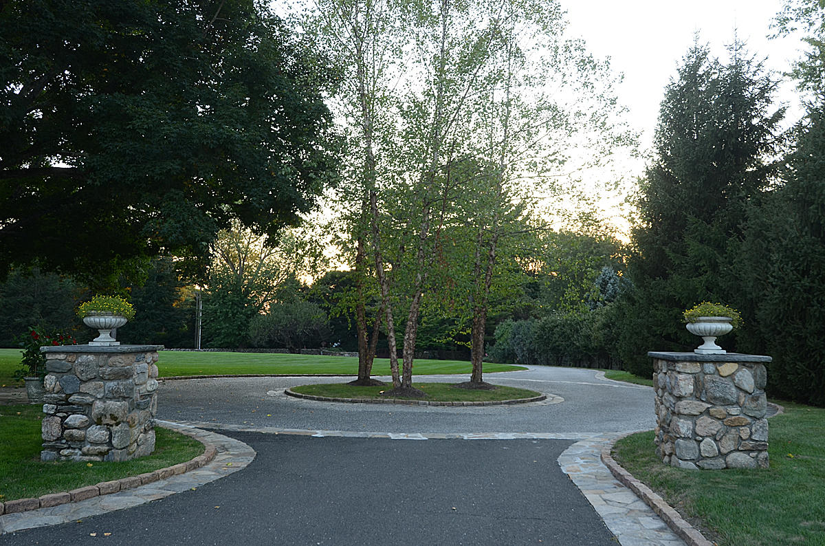 1081 Ponus Ridge Road New Canaan, CT 06840 - Photo 36 of 37 a view of a fountain in the middle of a park