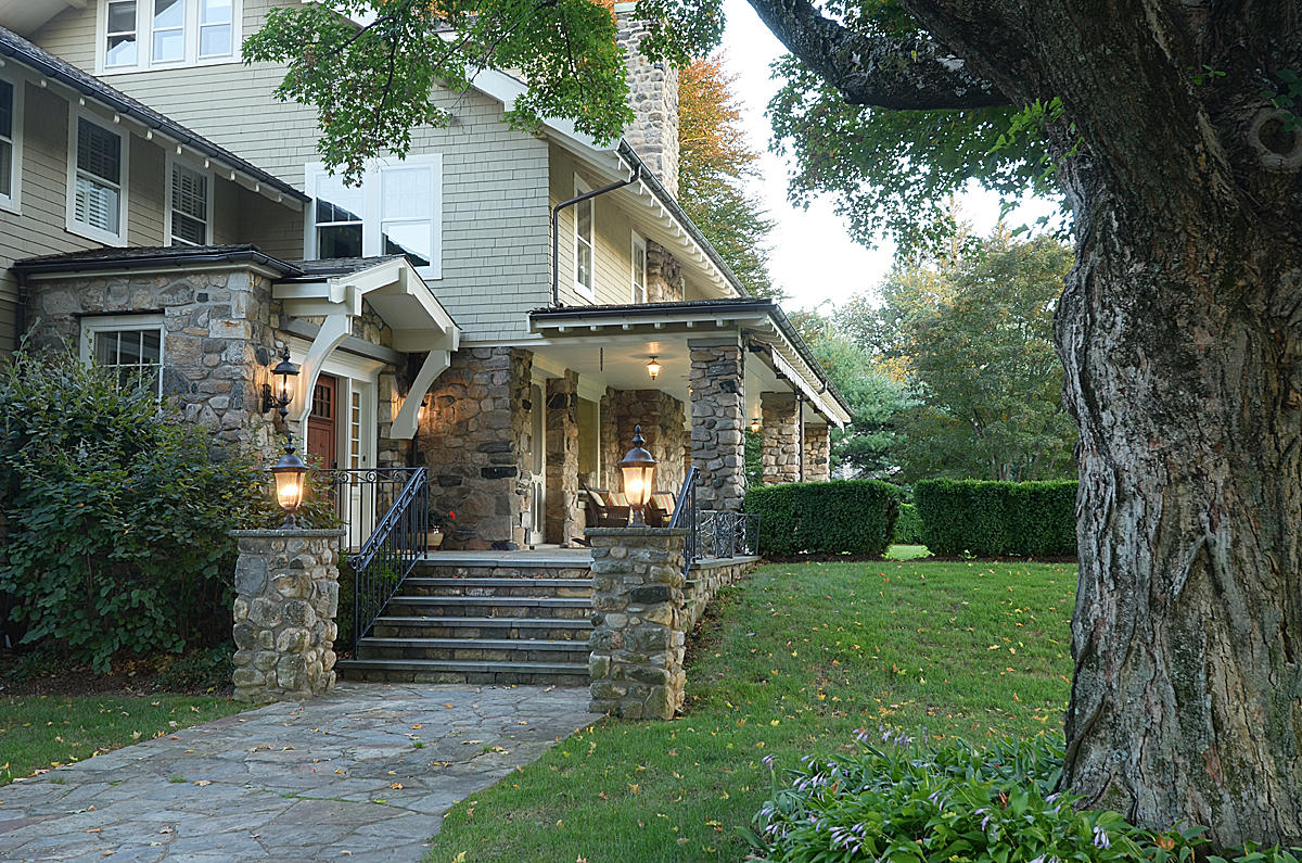 1081 Ponus Ridge Road New Canaan, CT 06840 - Photo 6 of 37 a front view of a house with garden