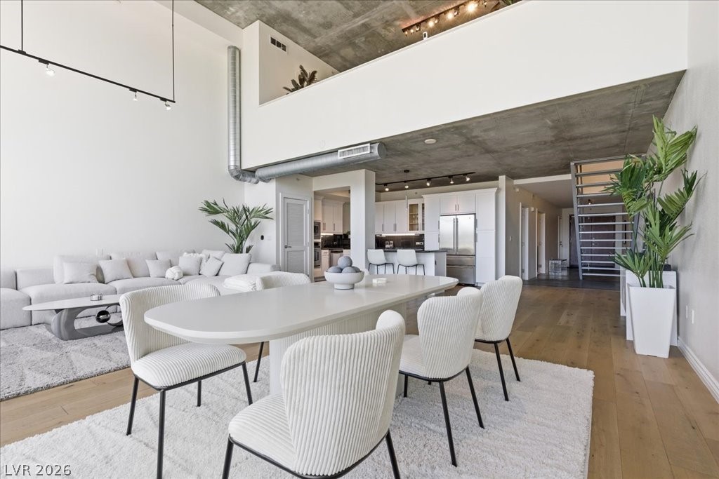 360 East Desert Inn Road, Unit 604 Las Vegas, NV 89109 - Photo 27 of 28 A spacious, open-concept living area with soaring ceilings and contemporary finishes.
