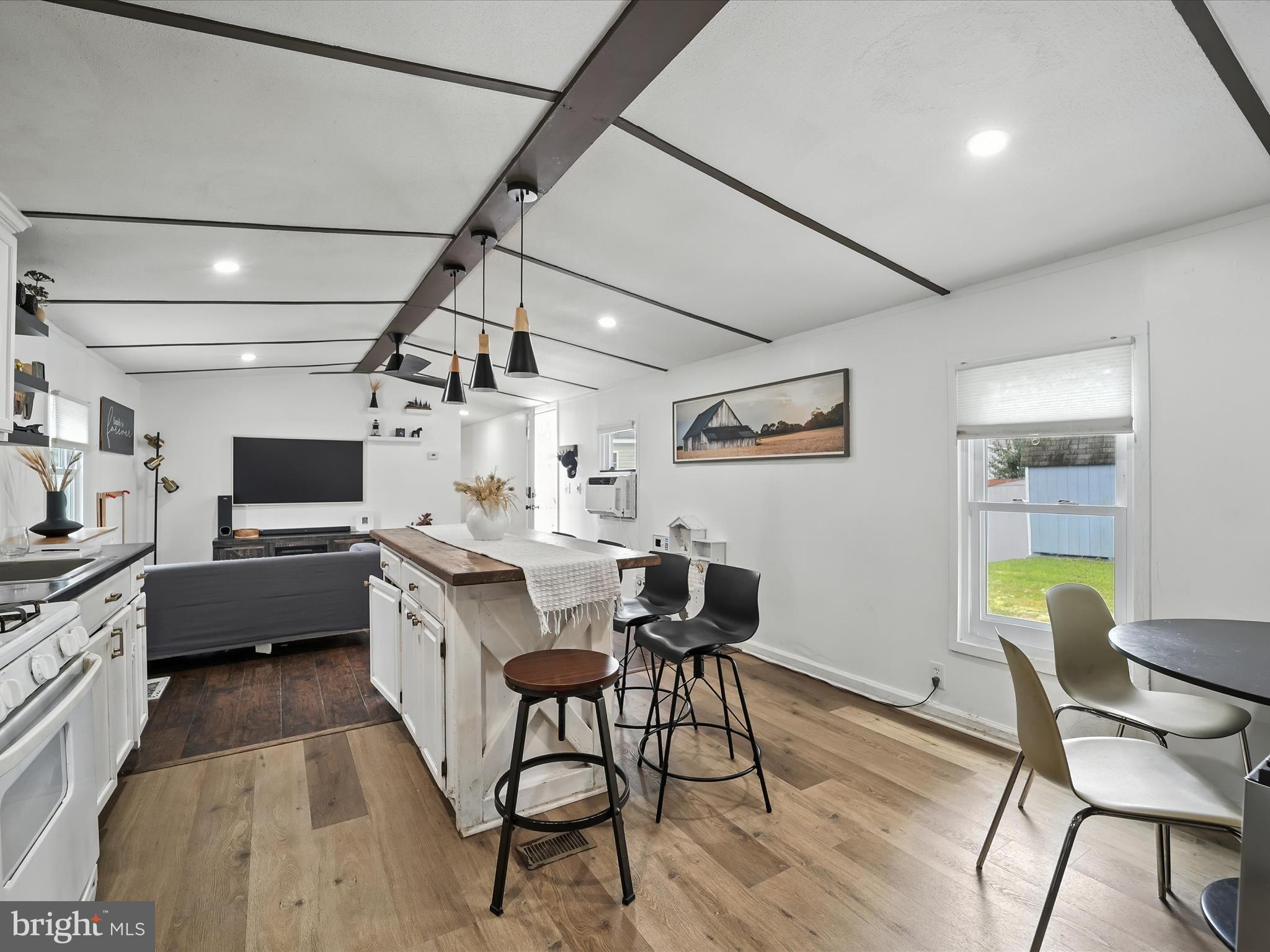 6 Patuxent Mobile Estates Lothian, MD 20711 - Photo 4 of 15 a kitchen with a table and chairs in it