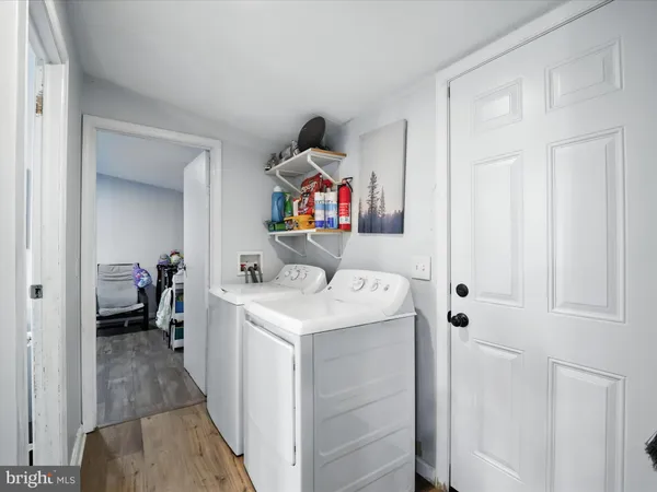 a storage room with washer and dryer