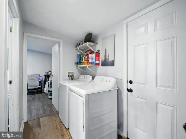 a storage room with washer and dryer