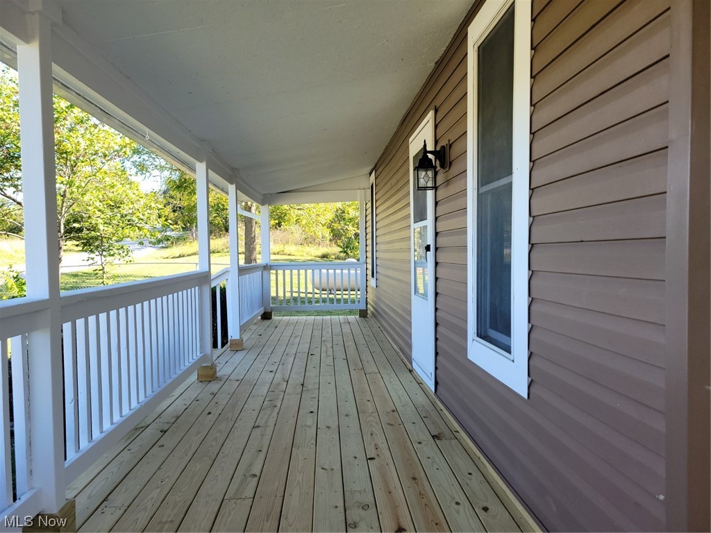 22922 Putney Ridge Road Quaker City, OH 43773 - Photo 30 of 31 View of deck