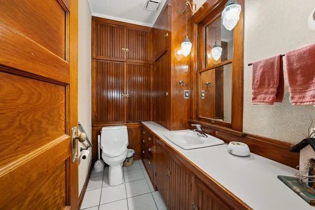 a room with lots of wooden furniture