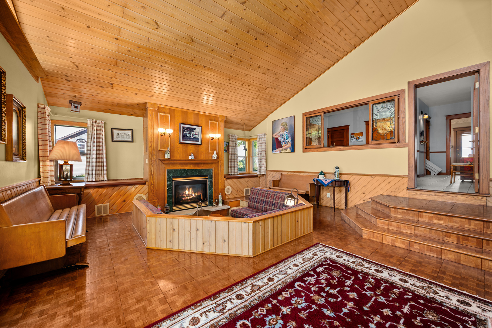 15165 Quigley Road Sycamore, IL 60178 - Photo 19 of 101 a living room with furniture and a fireplace