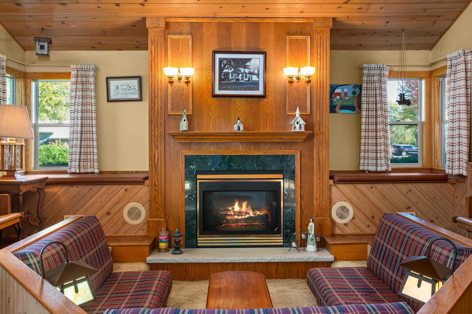 15165 Quigley Road Sycamore, IL 60178 - Photo 20 of 101 a living room with furniture and a fireplace
