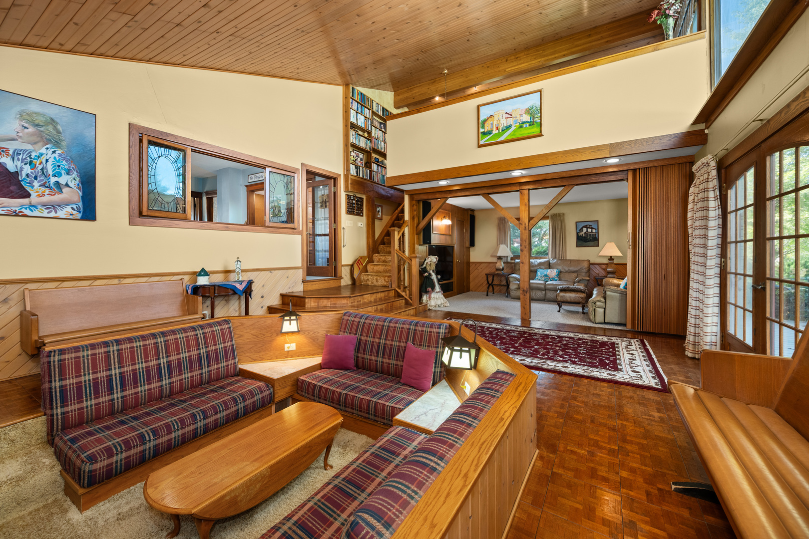 15165 Quigley Road Sycamore, IL 60178 - Photo 21 of 101 a living room with furniture a rug and a floor to ceiling window