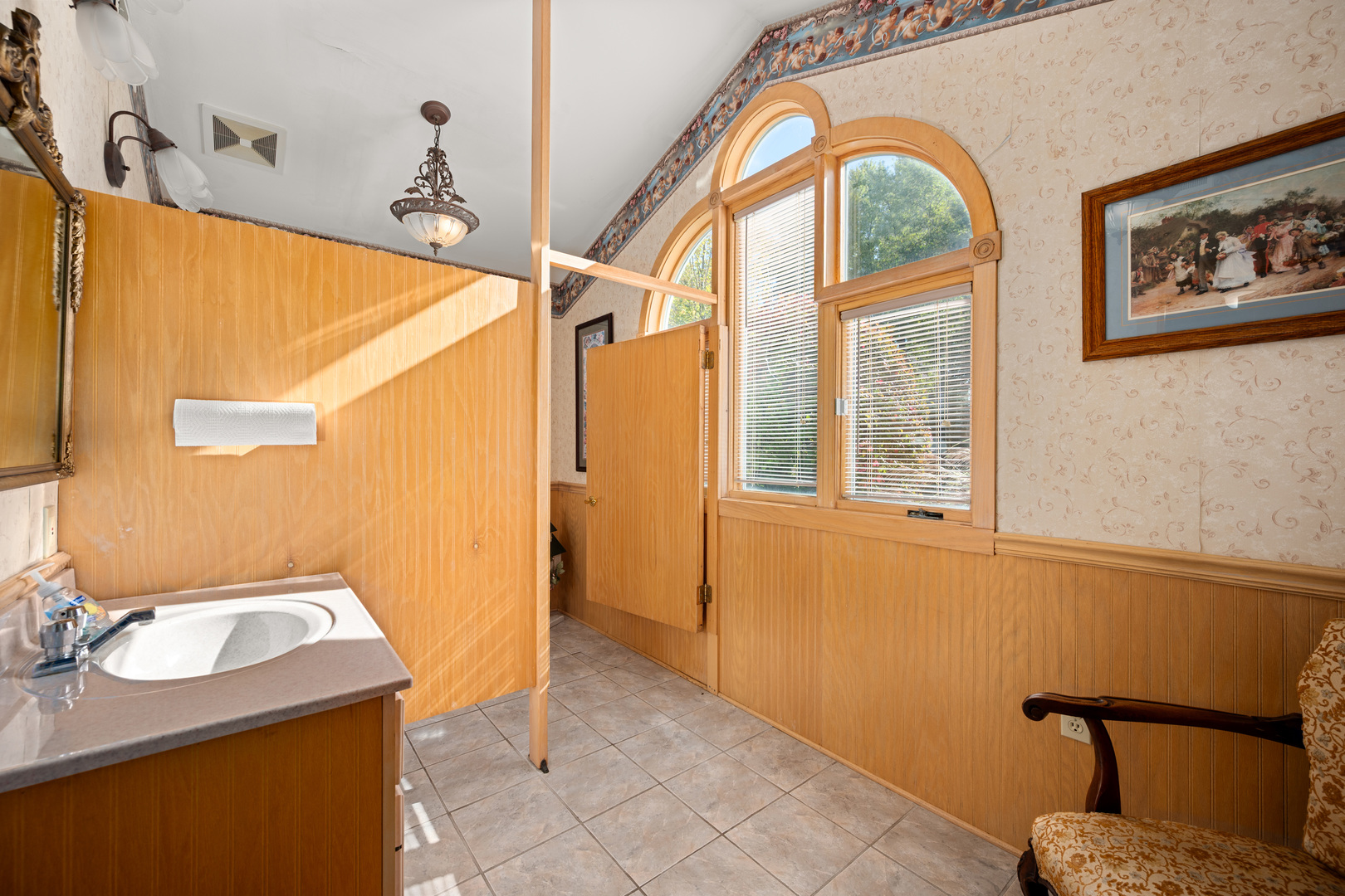 15165 Quigley Road Sycamore, IL 60178 - Photo 69 of 101 a bathroom with a sink and a mirror