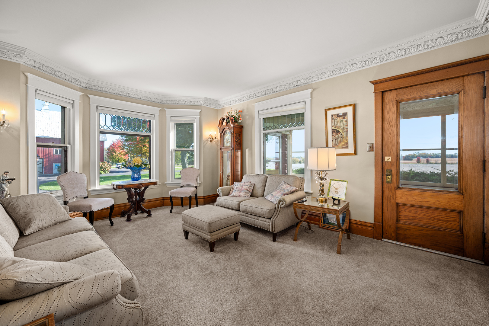 15165 Quigley Road Sycamore, IL 60178 - Photo 10 of 101 a living room with furniture and a window