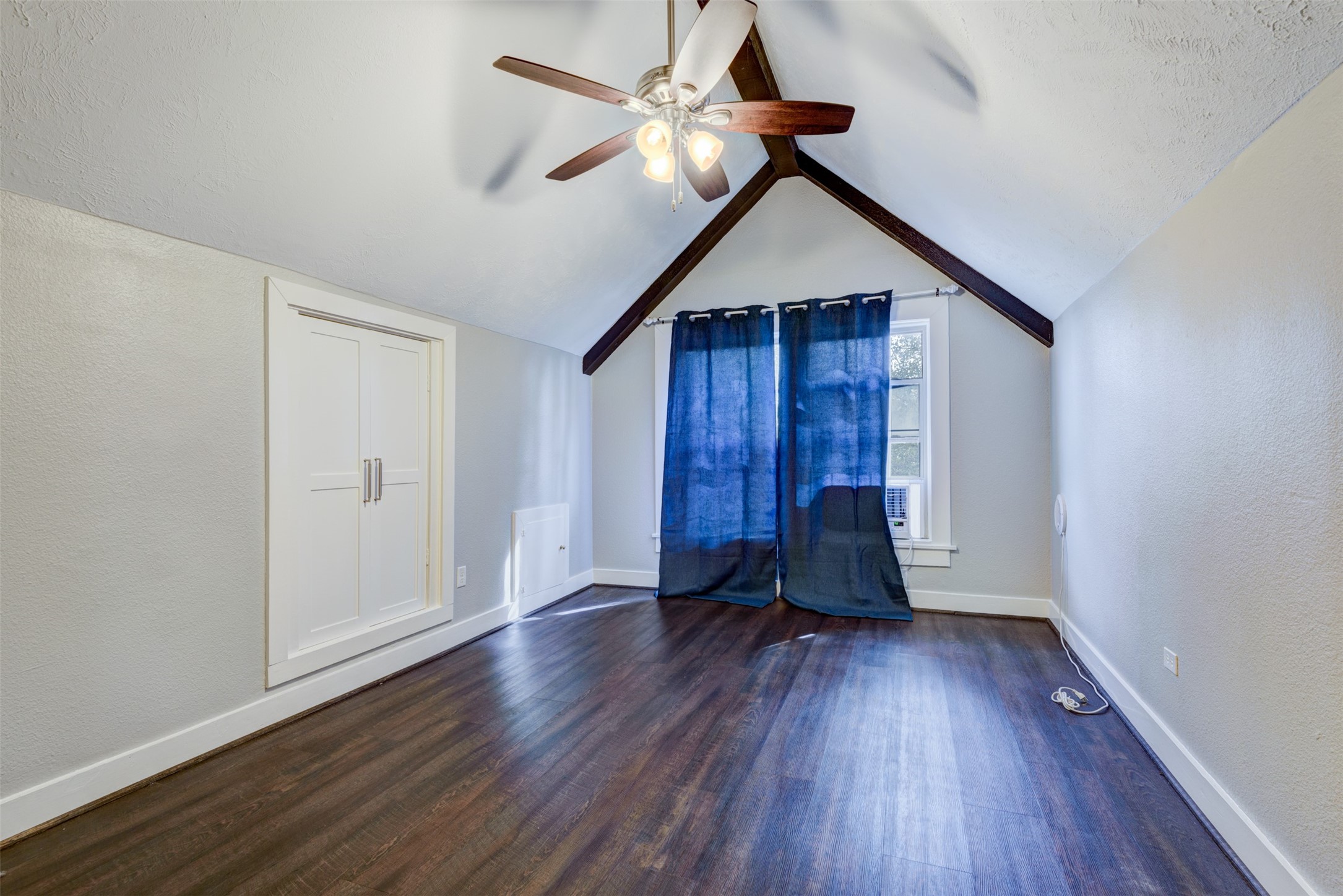1313 Peden Street Houston, TX 77006 - Photo 12 of 33 a view of room with hardwood floor ceiling fan