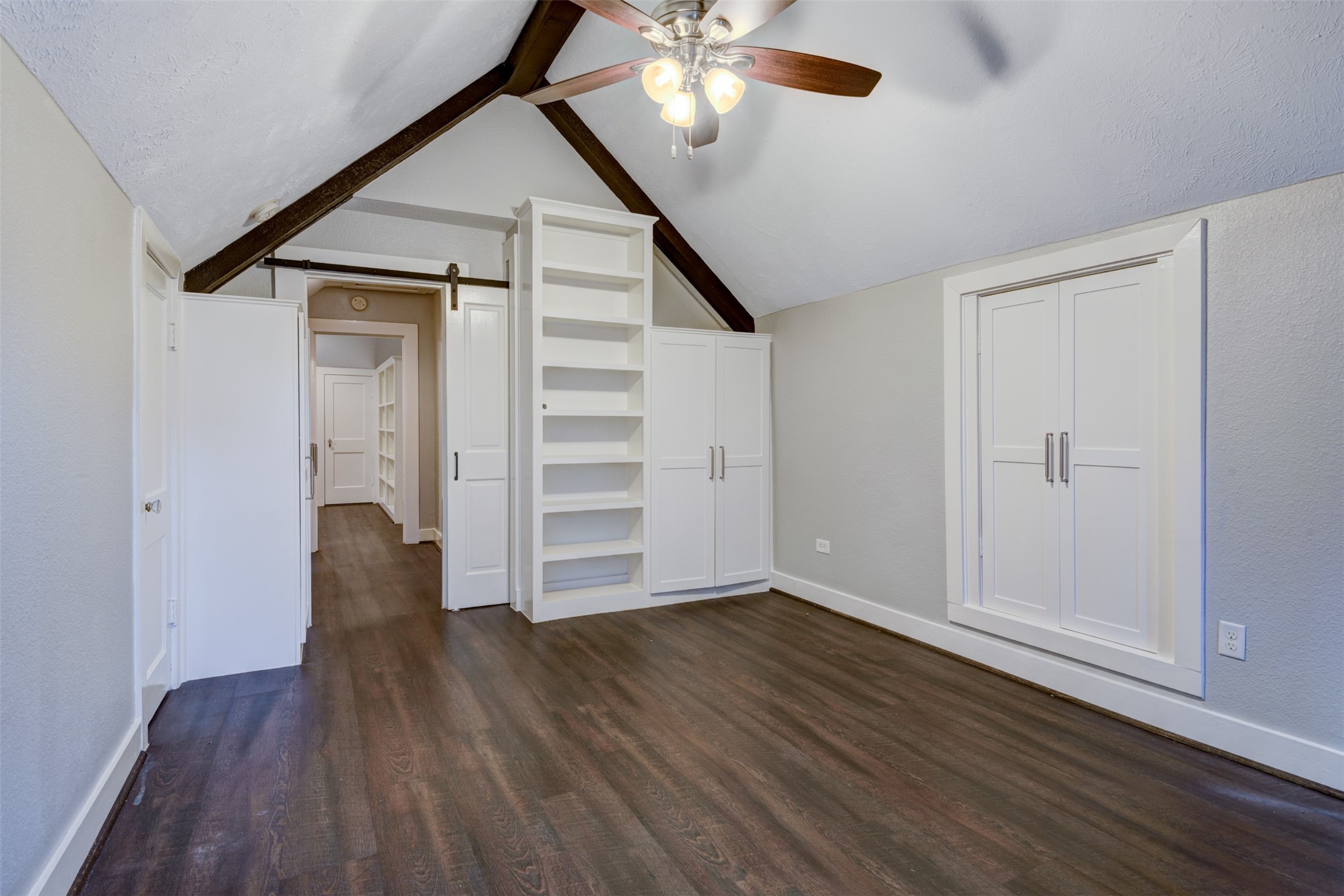 1313 Peden Street Houston, TX 77006 - Photo 13 of 33 a view of a livingroom with wooden floor and white walls