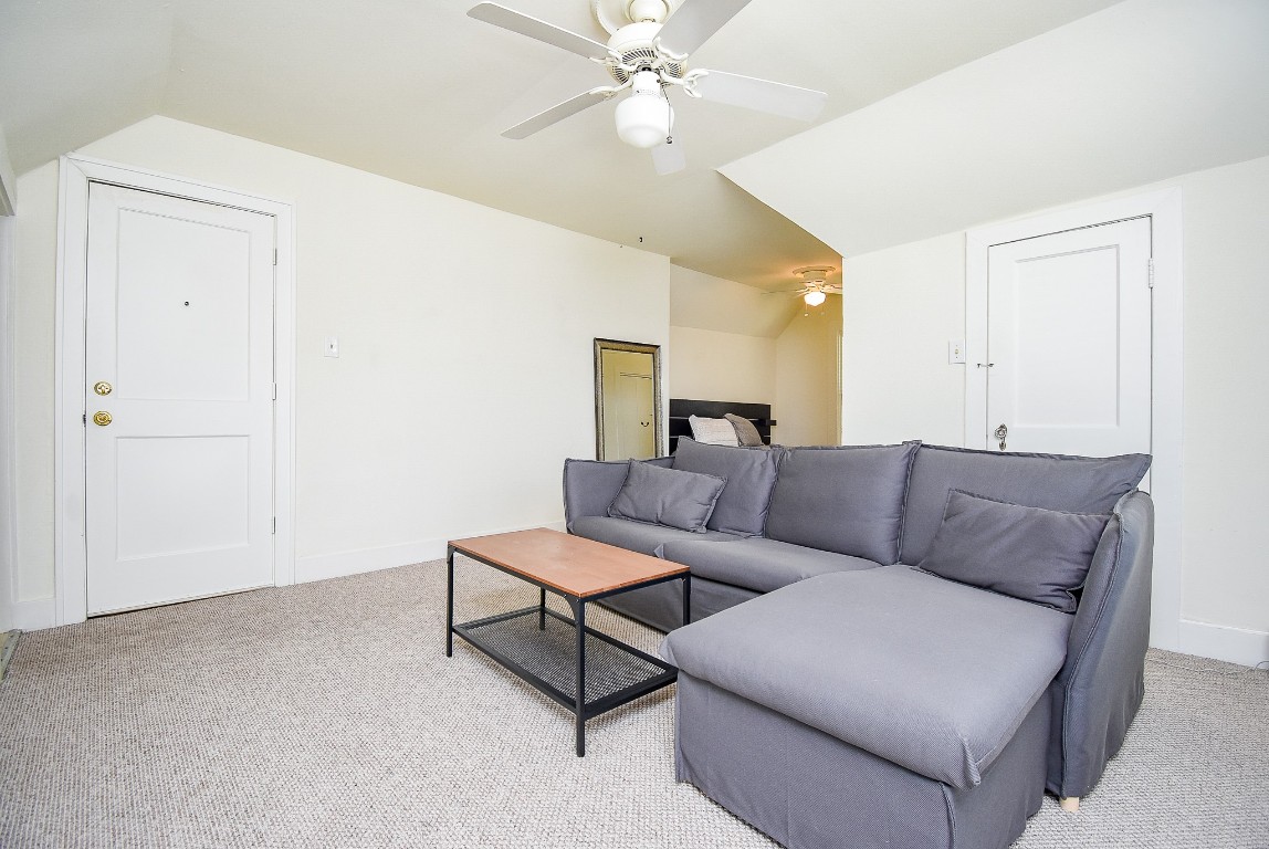 1313 Peden Street Houston, TX 77006 - Photo 14 of 33 a living room with furniture and a ceiling fan