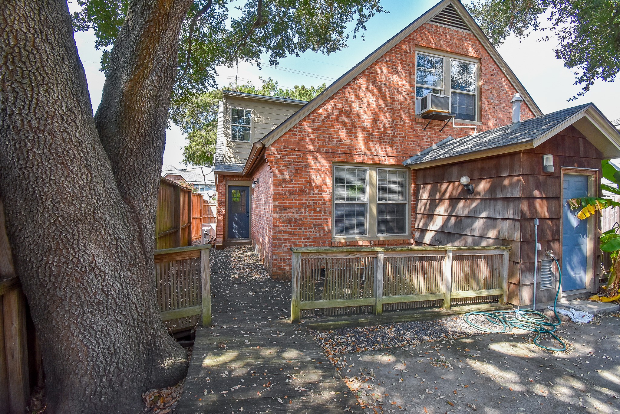 1313 Peden Street Houston, TX 77006 - Photo 24 of 33 a view of a house with a yard