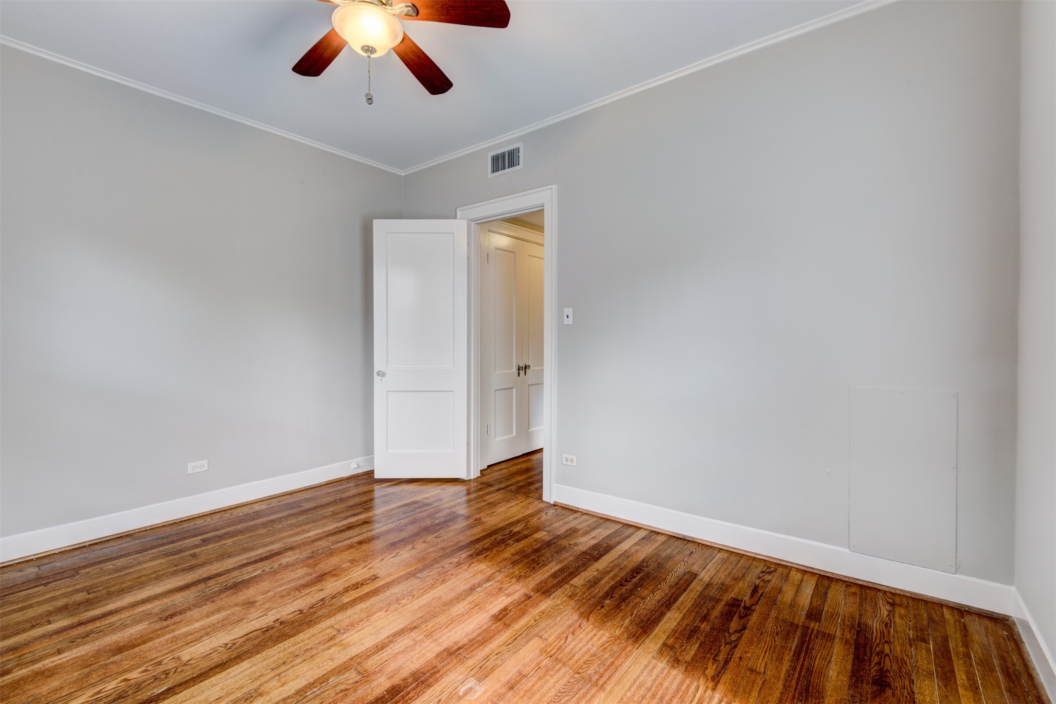 1313 Peden Street Houston, TX 77006 - Photo 32 of 33 wooden floor in an empty room