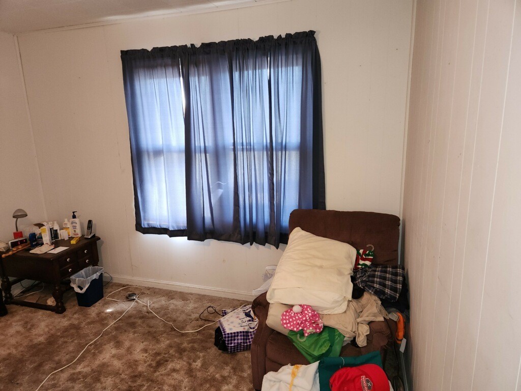 419 Fifth Street McLean, TX 79057 - Photo 28 of 34 a bedroom with a bed and a window