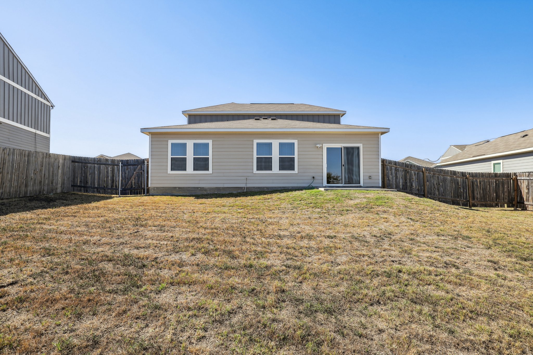 14105 Jeannette Rankin Rd Manor Manor, TX 78653 - Photo 27 of 29 Large backyard