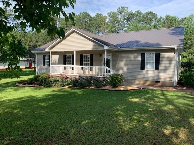 3893 High Falls Road Jackson, GA 30233 - Photo 1 of 1 a front view of a house with a yard