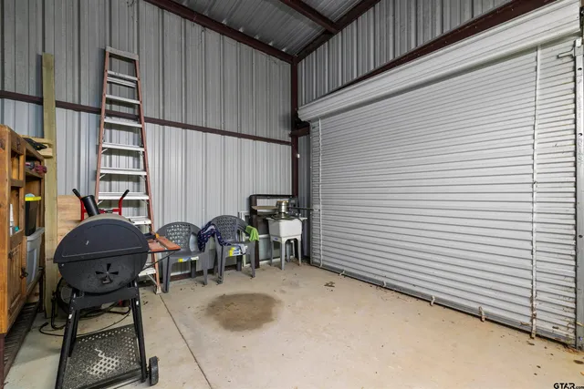 a view of a backyard with a cabin