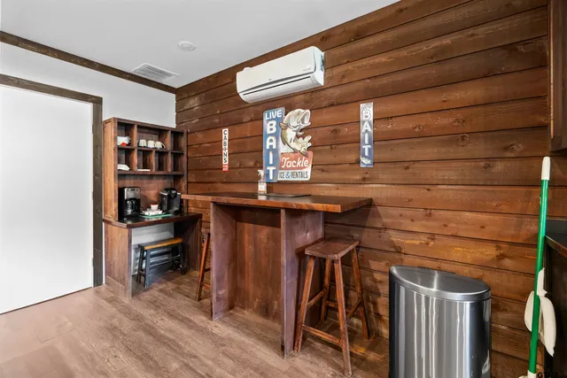 a view of kitchen with wooden floor
