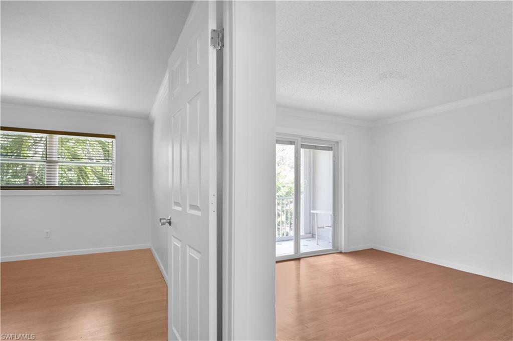 6777 Winkler Road, Unit 268 Fort Myers, FL 33919 - Photo 23 of 23 Bedroom & Living Room