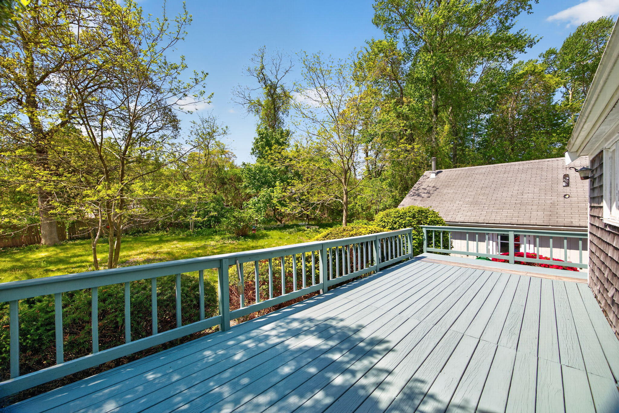 23 Nickerson Road Orleans, MA 02653 - Photo 32 of 54 a view of a wooden deck with a yard