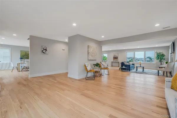 a view of a living room and dining room