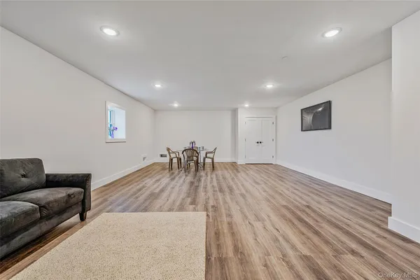 a view of livingroom with furniture and wooden floor