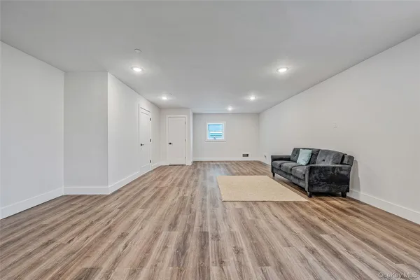 a view of a livingroom with wooden floor