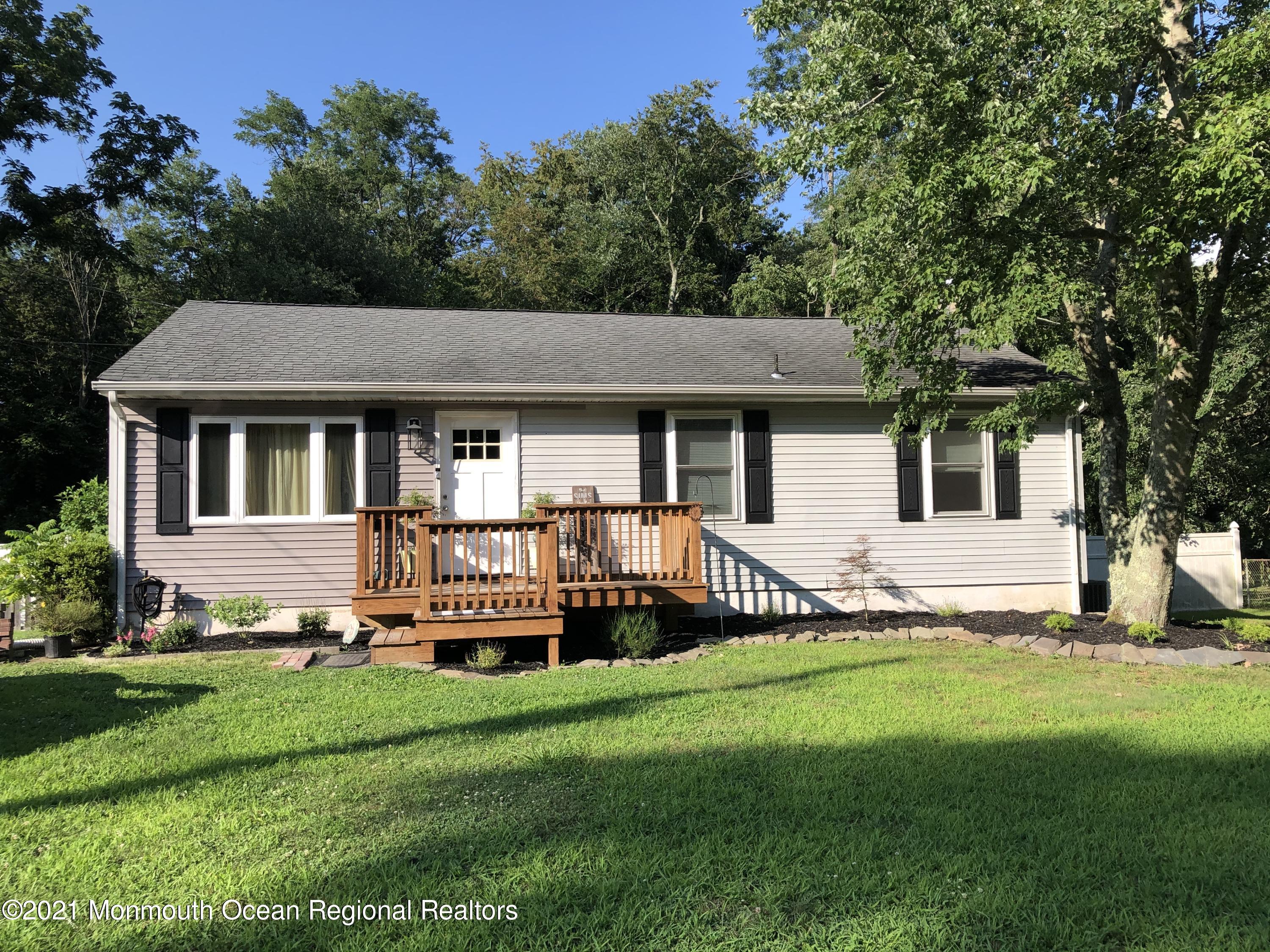 836 Wright Debow Road Jackson, NJ 08527 - Photo 1 of 22 a front view of a house with a yard