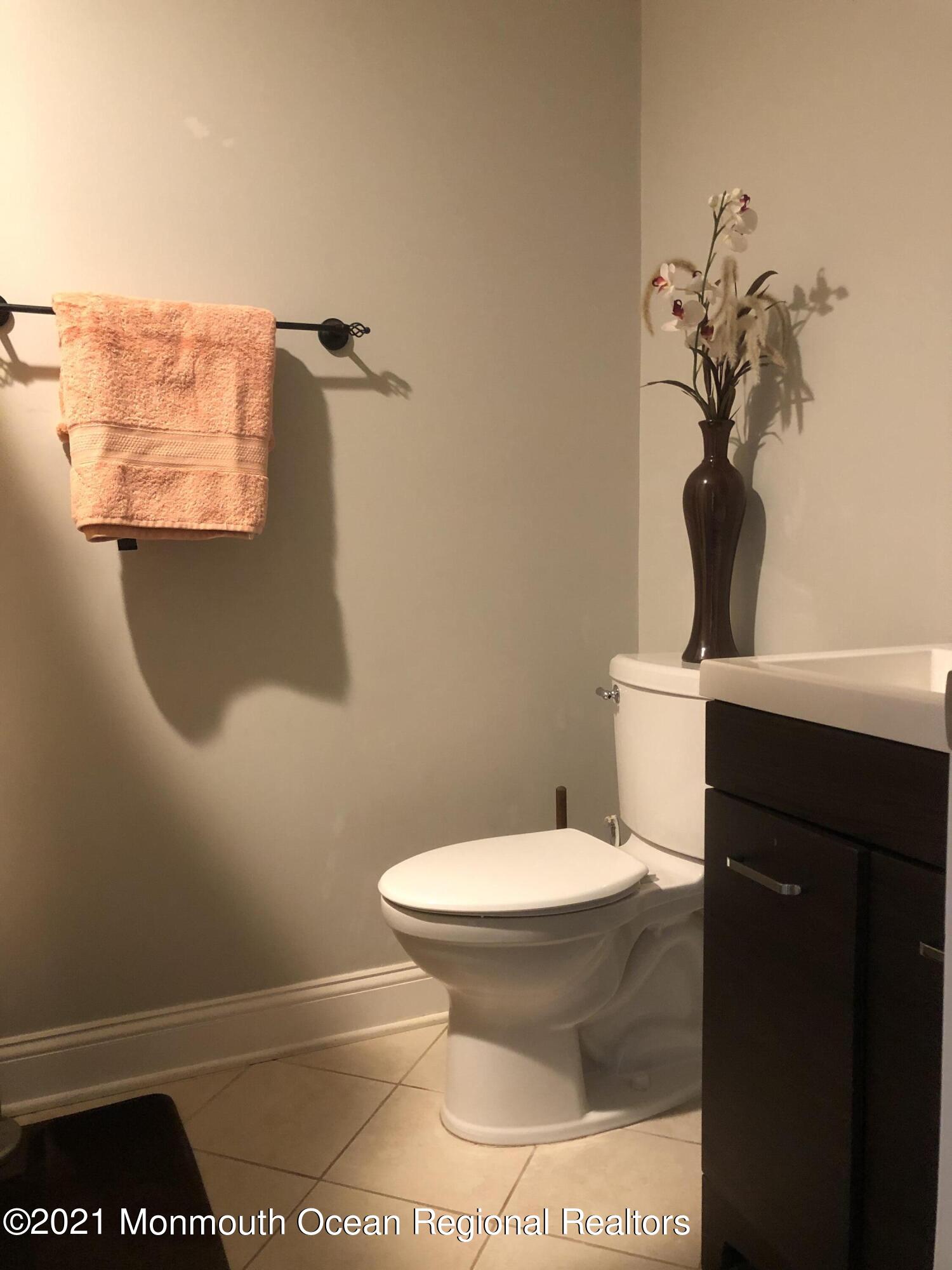 836 Wright Debow Road Jackson, NJ 08527 - Photo 13 of 22 a bathroom with a toilet and a mirror