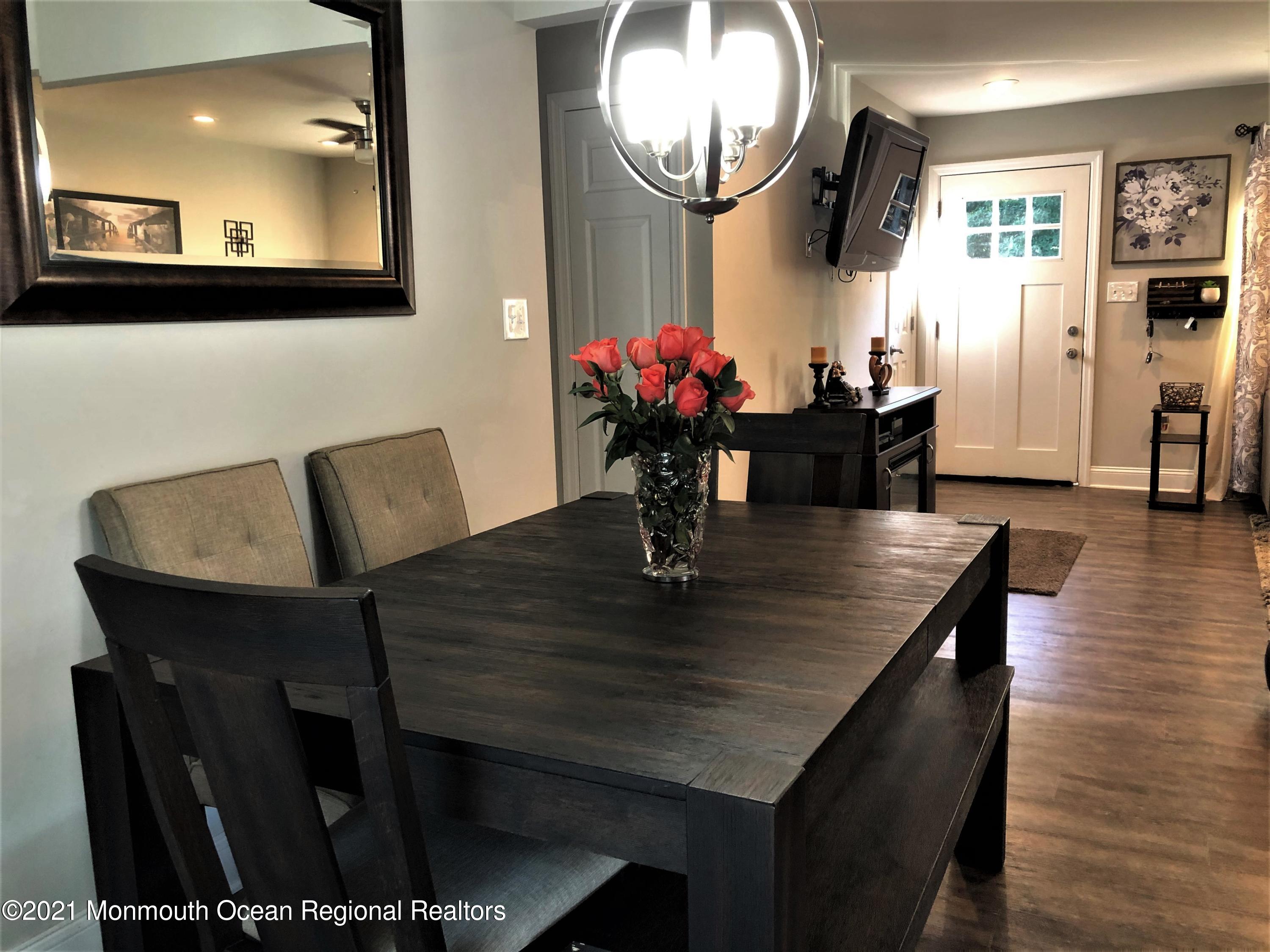 836 Wright Debow Road Jackson, NJ 08527 - Photo 5 of 22 a view of a dining room with furniture and wooden floor