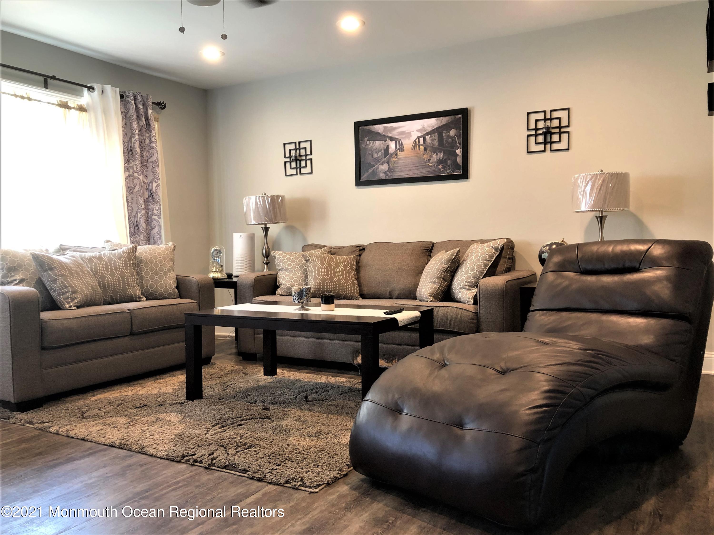 836 Wright Debow Road Jackson, NJ 08527 - Photo 8 of 22 a living room with furniture and a couch