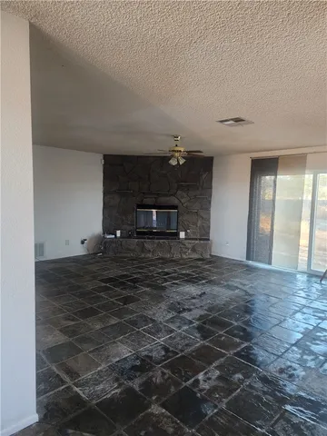 a view of a hallway with a fireplace