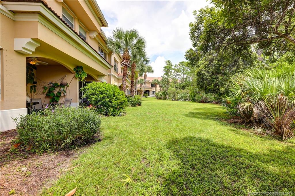 316 Southwest Otter Run Place Stuart, FL 34997 - Photo 36 of 50 a view of a house with a street