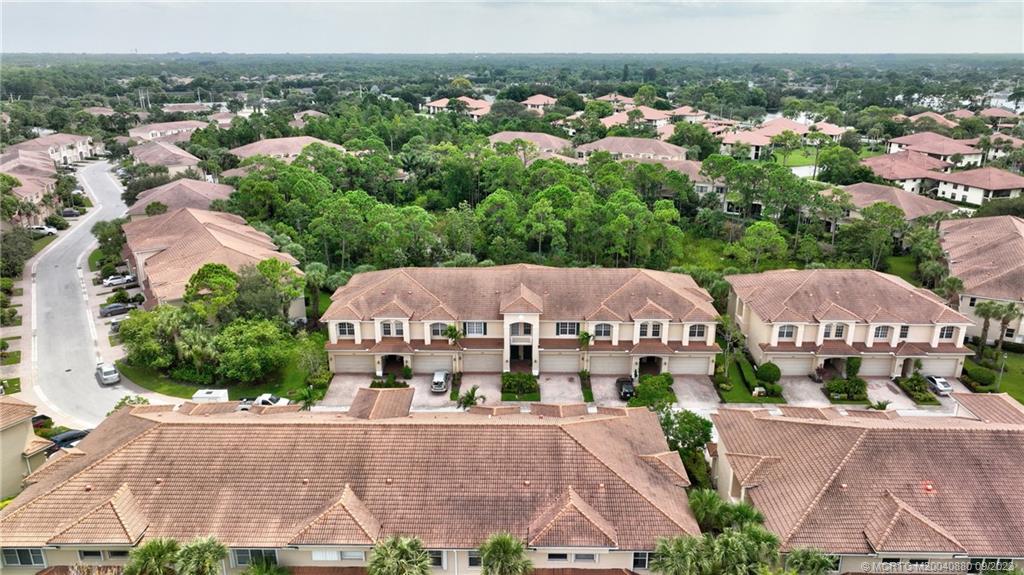 316 Southwest Otter Run Place Stuart, FL 34997 - Photo 39 of 50 an aerial view of a house with a garden