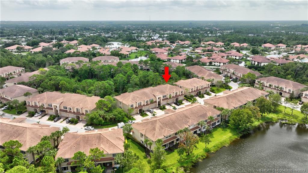 316 Southwest Otter Run Place Stuart, FL 34997 - Photo 42 of 50 an aerial view of multiple house