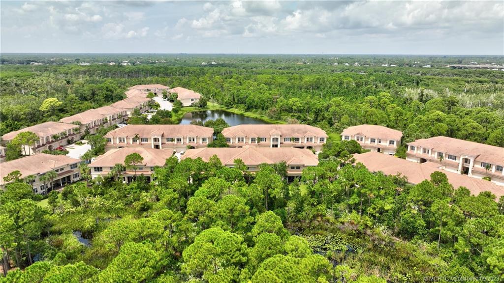 316 Southwest Otter Run Place Stuart, FL 34997 - Photo 46 of 50 a picture of a city with lots of green space
