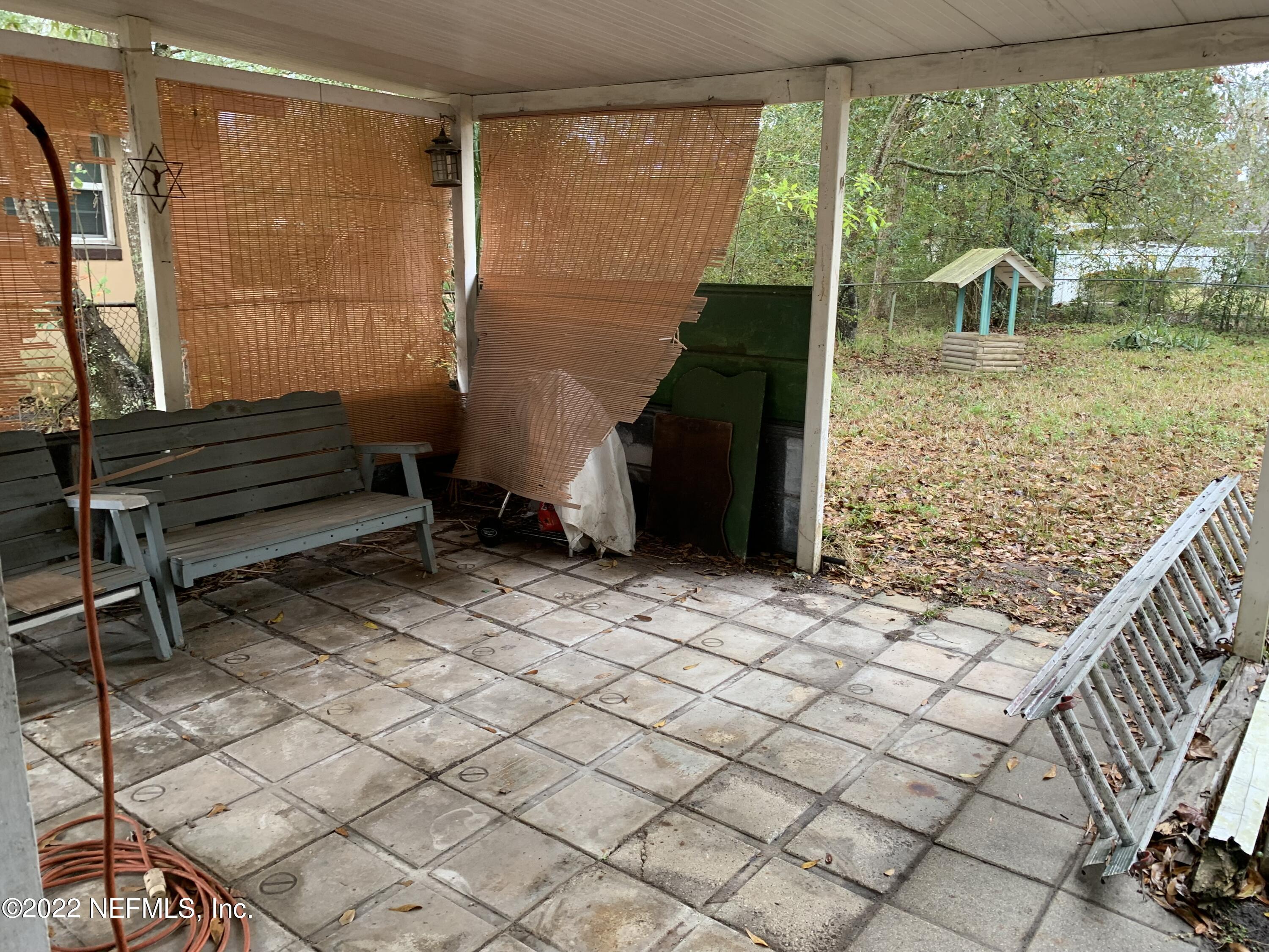 7014 Rollo Road Jacksonville, FL 32205 - Photo 20 of 21 a view of outdoor space with seating area
