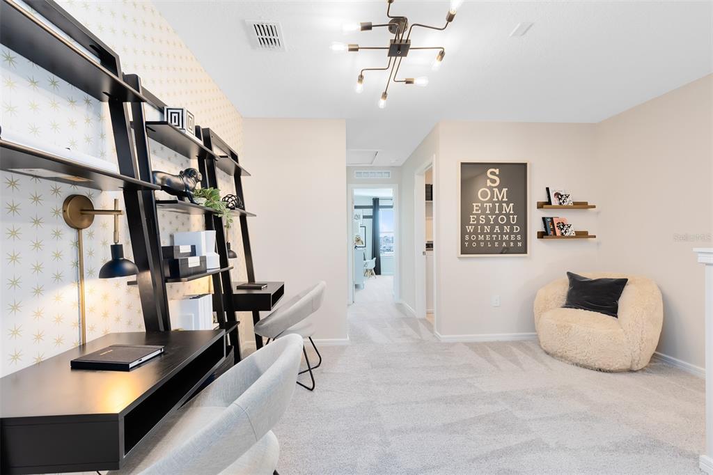 11483 Harborview Street Orlando, FL 32832 - Photo 18 of 26 a living room with furniture and a window