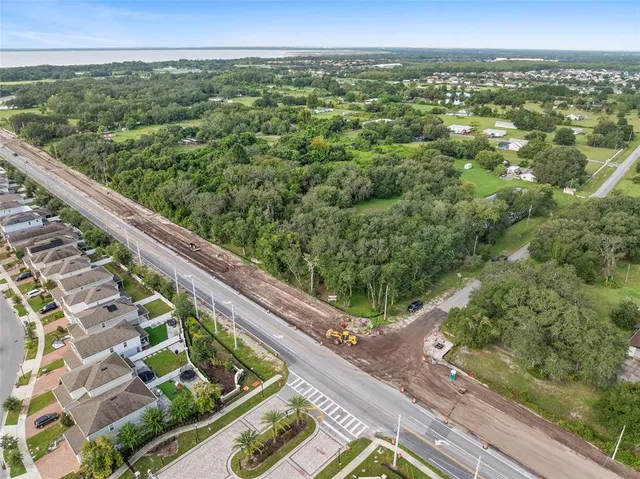 a view of a city from a balcony with outdoor space