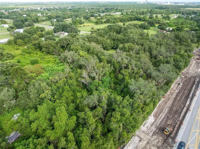 a view of a city from a balcony with outdoor space