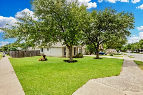 a view of a backyard with a garden
