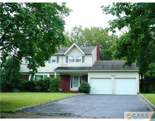 3 Baltic Street Edison, NJ 08820 - Photo 13 of 16 a front view of a house with garden