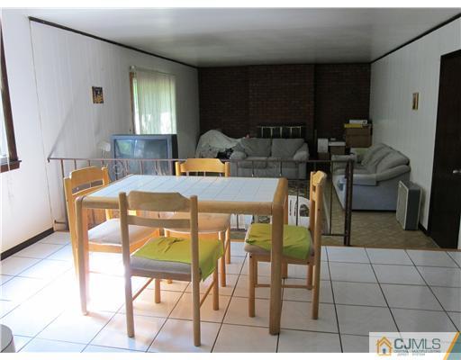 3 Baltic Street Edison, NJ 08820 - Photo 5 of 16 a view of a dining room with furniture