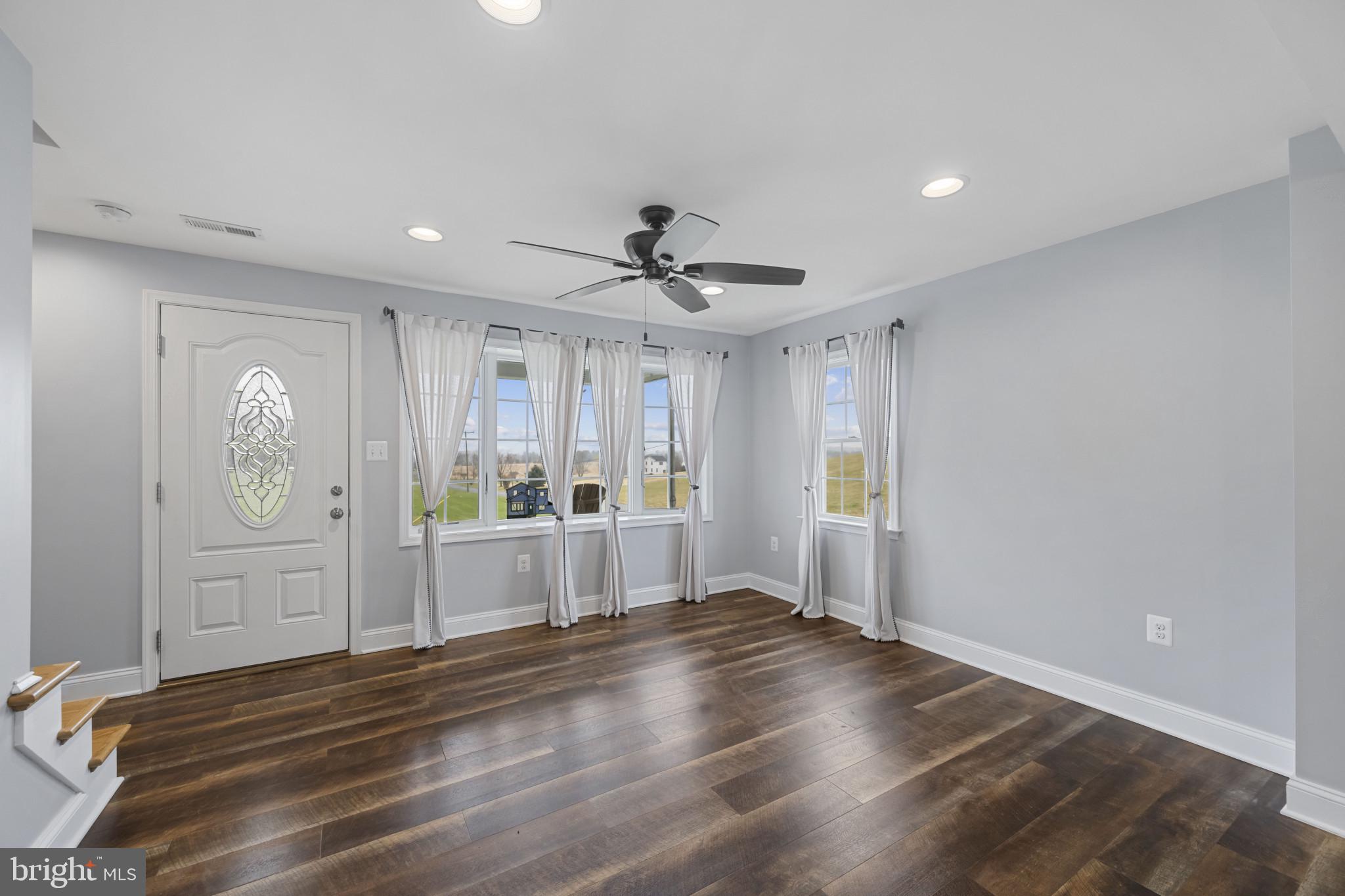 35 South Mcdermott Road, Unit A Pylesville, MD 21132 - Photo 14 of 35 a view of empty room with wooden floor
