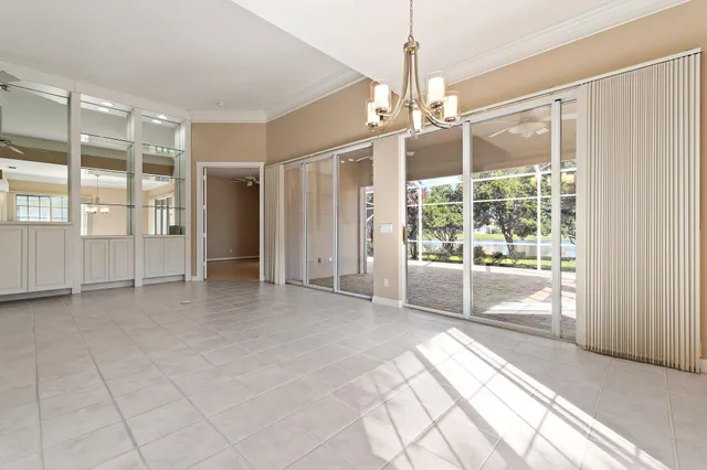 an aerial view of residential houses with outdoor space and street view
