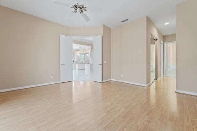 a view of a lake with houses in the background