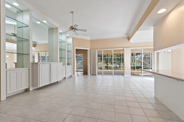 a kitchen with stainless steel appliances granite countertop a sink and a refrigerator